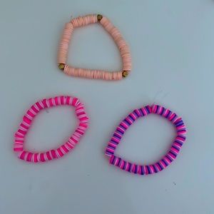 There are 3 clay bead bracelets in this kit with great colors and accessories.
